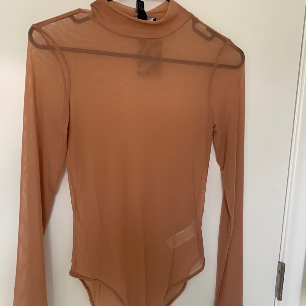 Orange sheer body suit